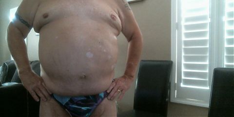 Lelio53 exposes his big belly before heading off to the pool.